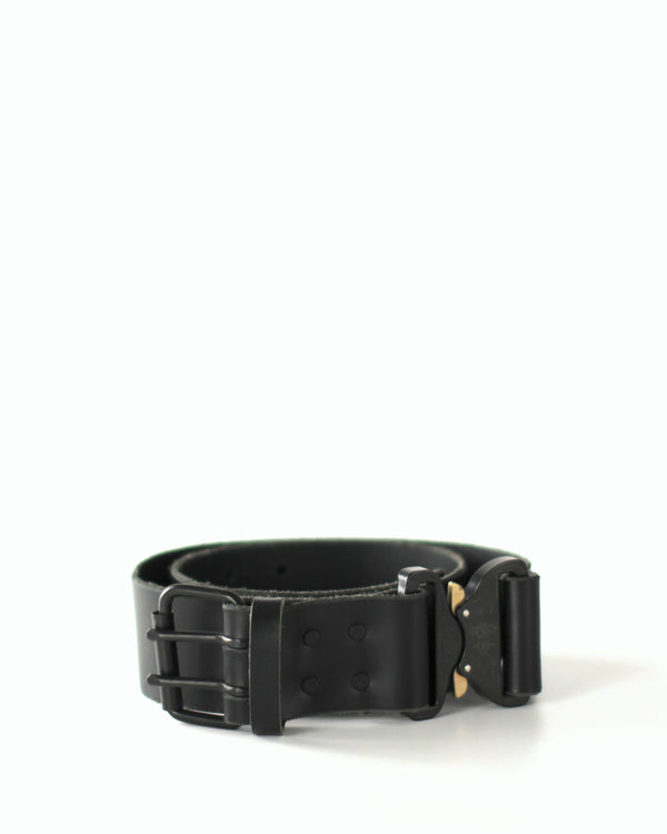 A black leather belt with a COBRA buckle and black hardware, against a white background.